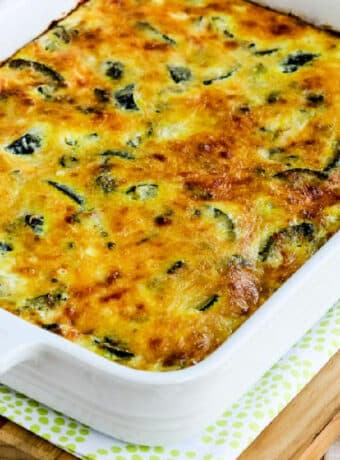 Cheesy Zucchini and Basil Strata shown in baking dish.