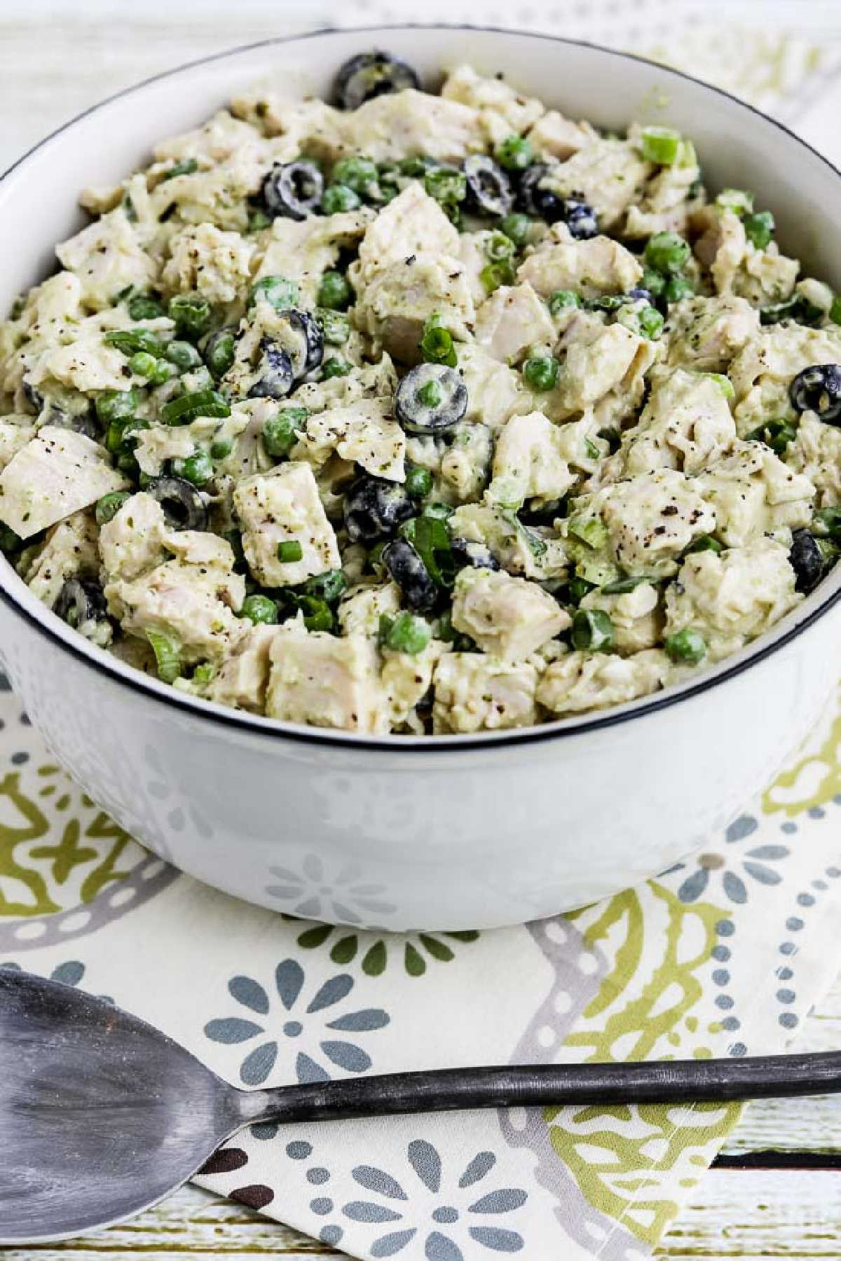 Chicken Pesto Salad in serving bowl with fork