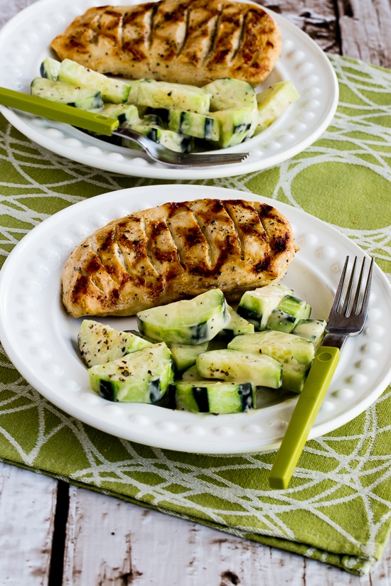 Completely Foolproof 100% Delicious Grilled Chicken finished chicken on plate with Cucumbers Caesar