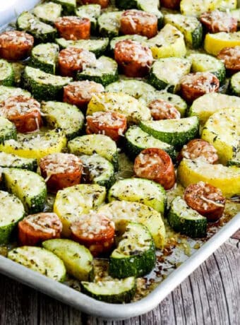 Cheesy Zucchini and Sausage Sheet Pan Meal square image of meal on baking sheet