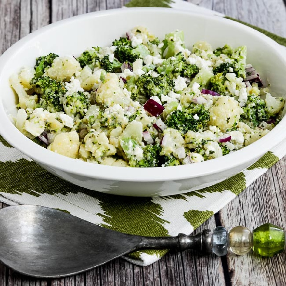 square image of Broccoli and Cauliflower Salad with Feta in serving bowl