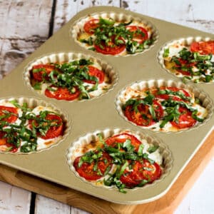 Crustless Tomato Basil Tarts shown in baking pan.
