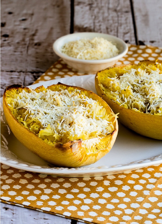 Spaghetti Squash with Mizithra Cheese and Browned Butter shown on serving plate with Mizithra in background
