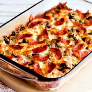 square image for Low-Carb Deconstructed Pizza Casserole in baking dish on cutting board