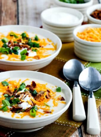 square image of Instant Pot Loaded Cauliflower Soup in two bowls