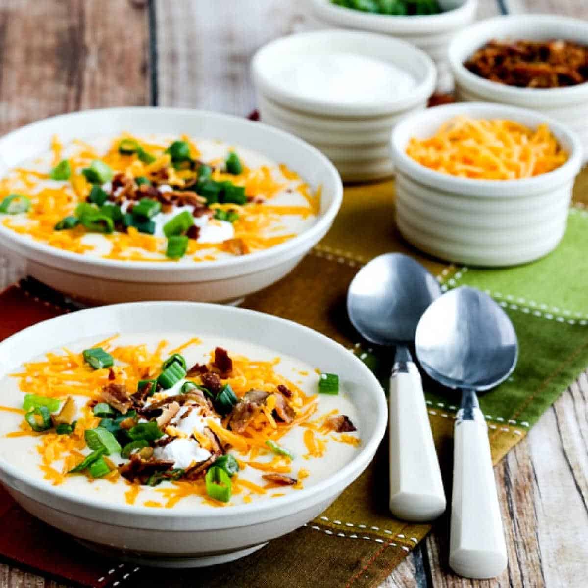 square image of Instant Pot Loaded Cauliflower Soup in two bowls