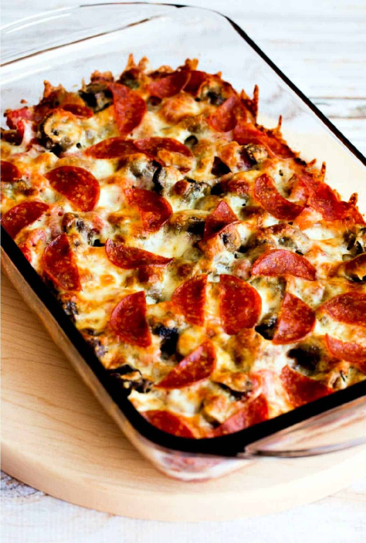 Low-Carb Deconstructed Pizza Casserole in baking dish on cutting board