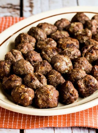 Baked Swedish Meatballs shown on serving platter.