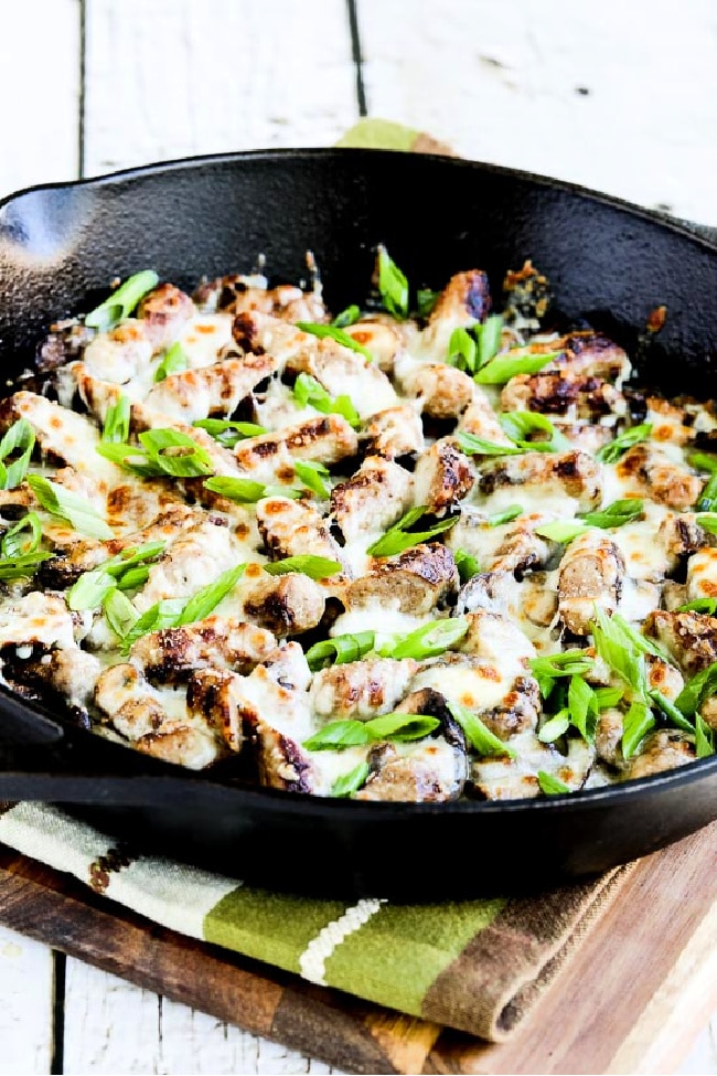 Cheesy Low-Carb No-Egg Sausage Mushroom Breakfast finished dish in cast iron skillet