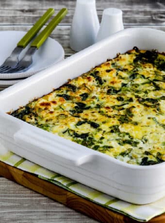 square image for Breakfast Casserole with Spinach and Goat Cheese shown in baking dish.