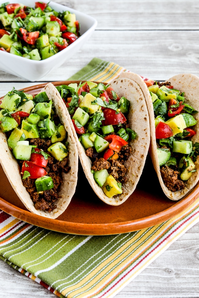 Ground Beef Tacos with Tomato-Avocado Salsa finished tacos with a side of salsa.