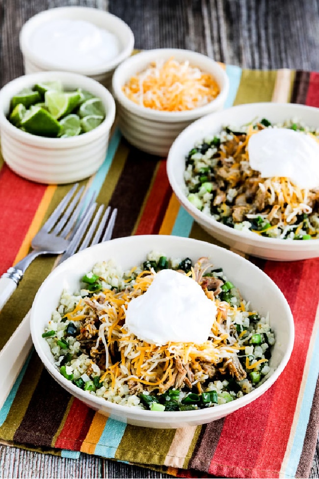 Green Chile Pork Taco Bowl finished meal in two serving bowls