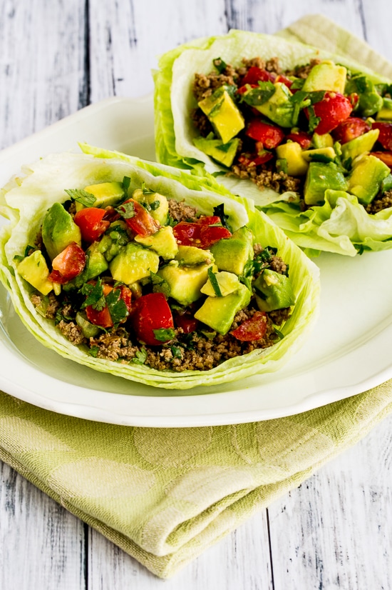Turkey Lettuce Wrap Tacos on serving plate with avocado salsa