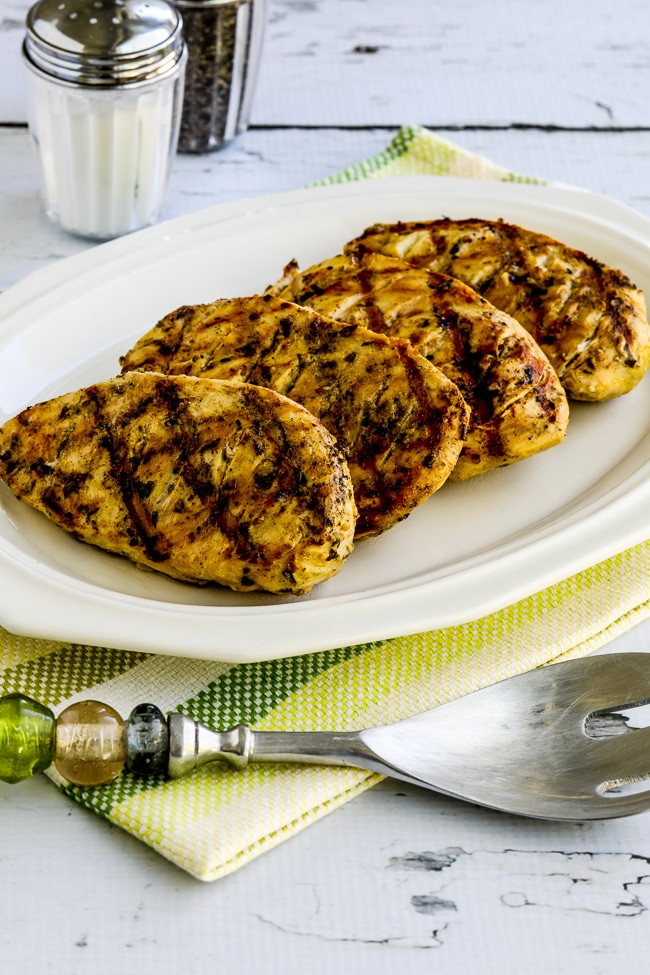 Grilled Tarragon Chicken finished chicken breasts on serving plate