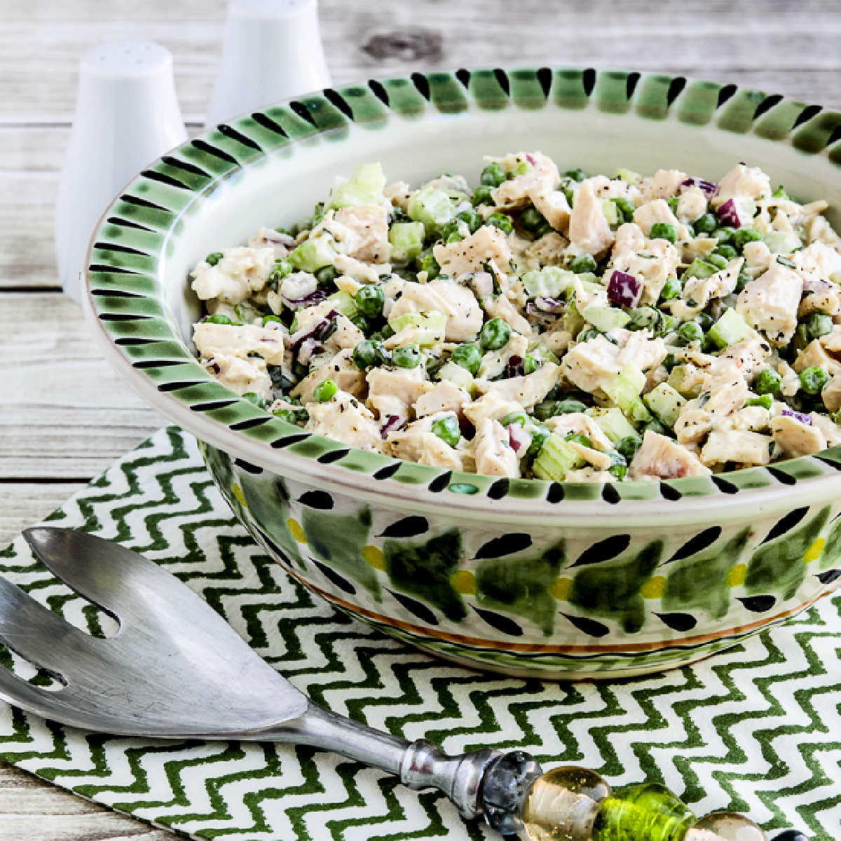 Tarragon Chicken Salad in colorful salad bowl with serving fork.