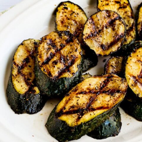 Perfect grilled zucchini on serving plate.