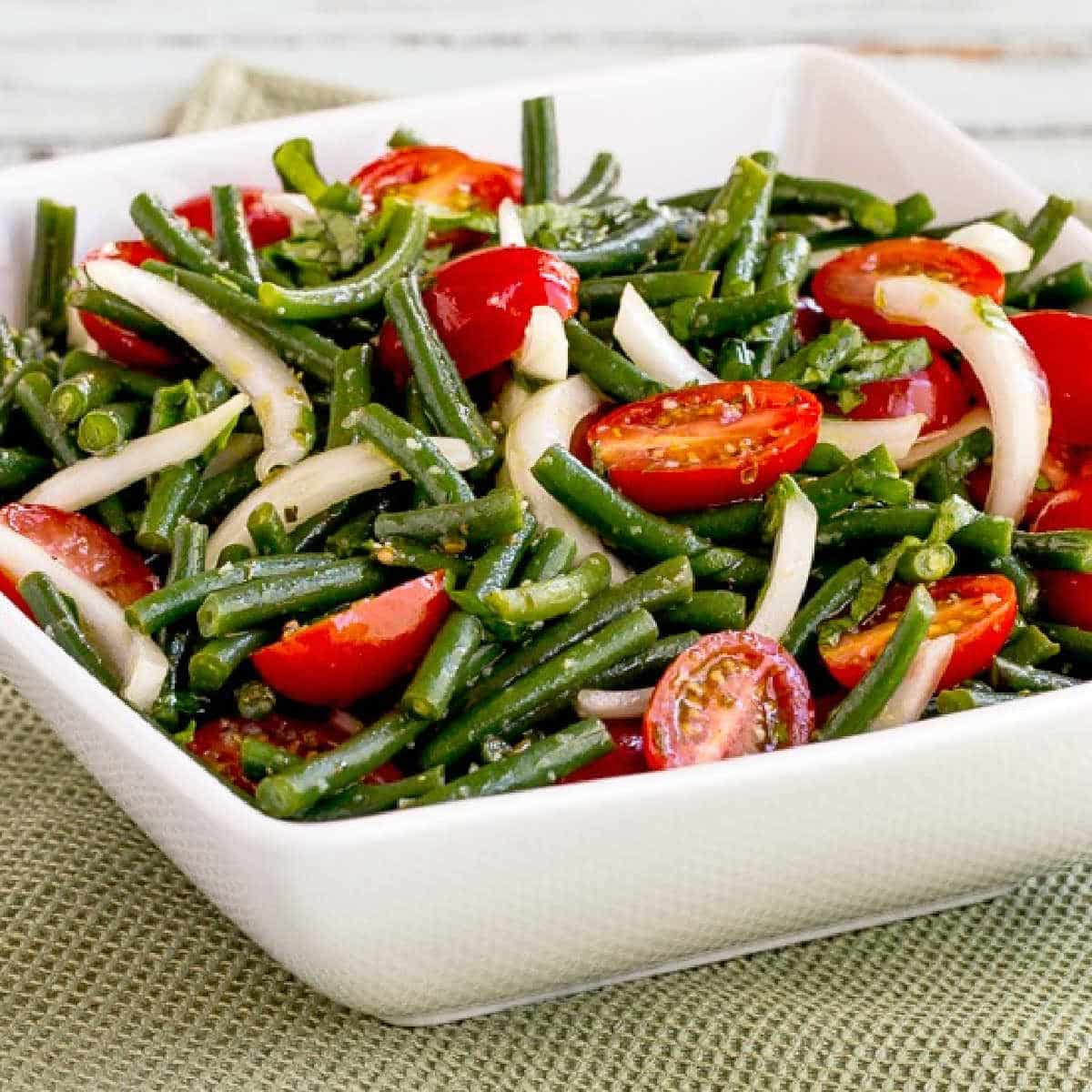 square image of Green Bean Tomato Salad in serving bowl