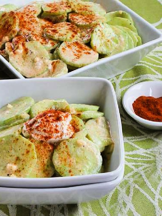 Al's Famous Hungarian Cucumber Salad in two bowls with paprika