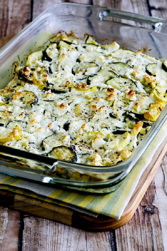 Zucchini Bake with Feta and Thyme shown in baking dish on napkin