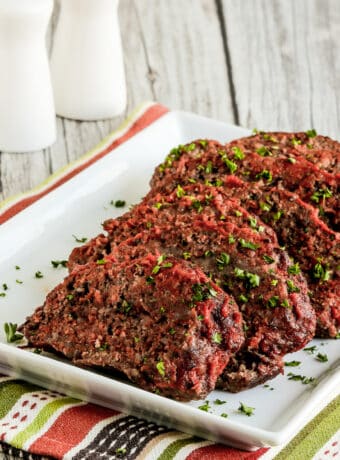 Square image of Beef and Sausage Italian Meatloaf on serving plate