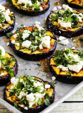 Grilled Eggplant with Feta and Herbs shown on sheet pan.