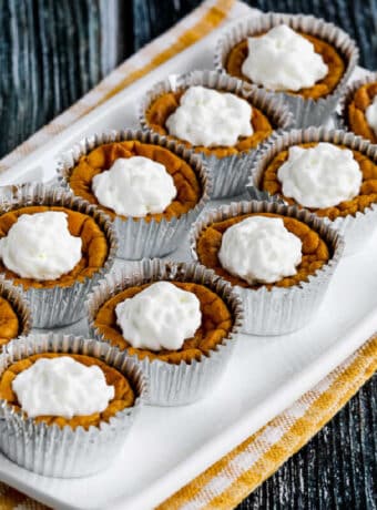square image of 10 Mini Pumpkin Cheesecakes on serving platter