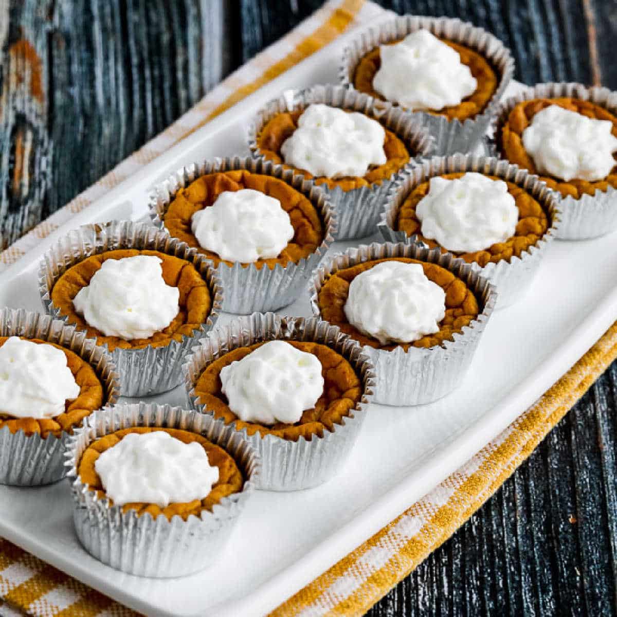 square image of 10 Mini Pumpkin Cheesecakes on serving platter