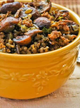 Square image for Wild Rice Stuffing with Sausage and Mushrooms shown in serving bowl.