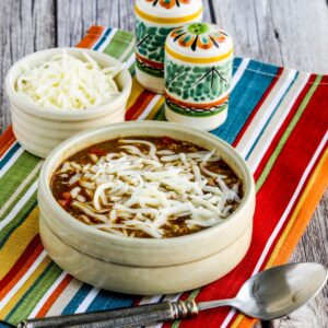 Green Chile Turkey Enchilada Soup thumbnail image of finished soup with cheese