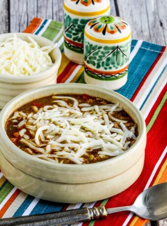 Green Chile Turkey Enchilada Soup thumbnail image of finished soup with cheese
