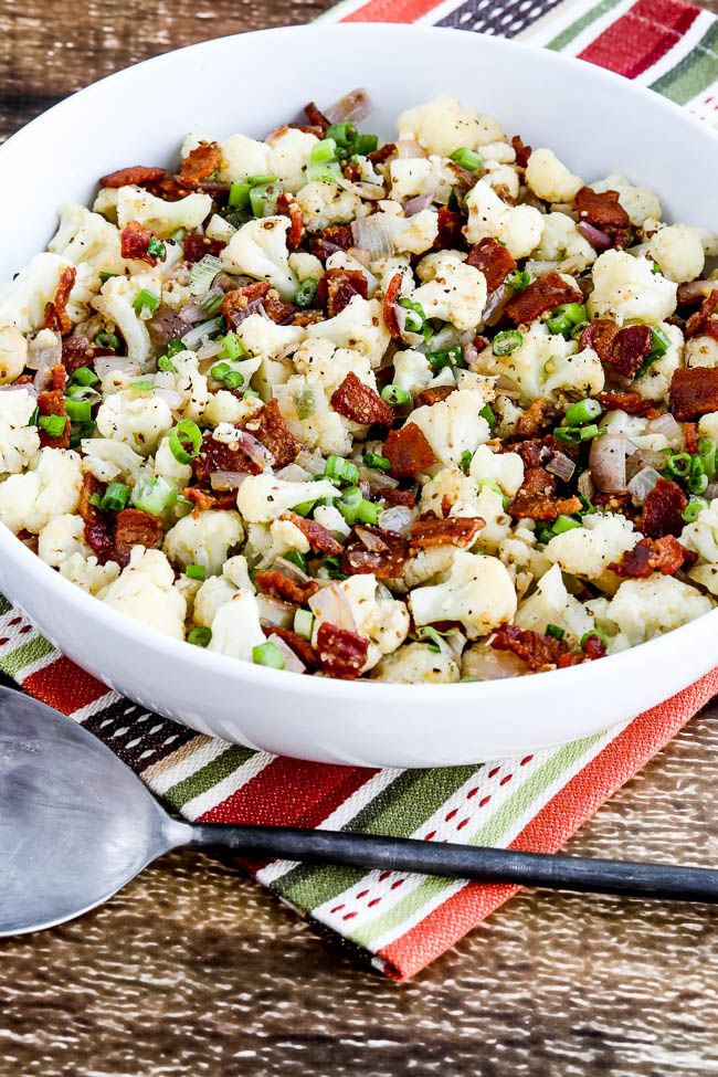 Low-Carb German Potato Salad in serving Bowl with red-green napkin