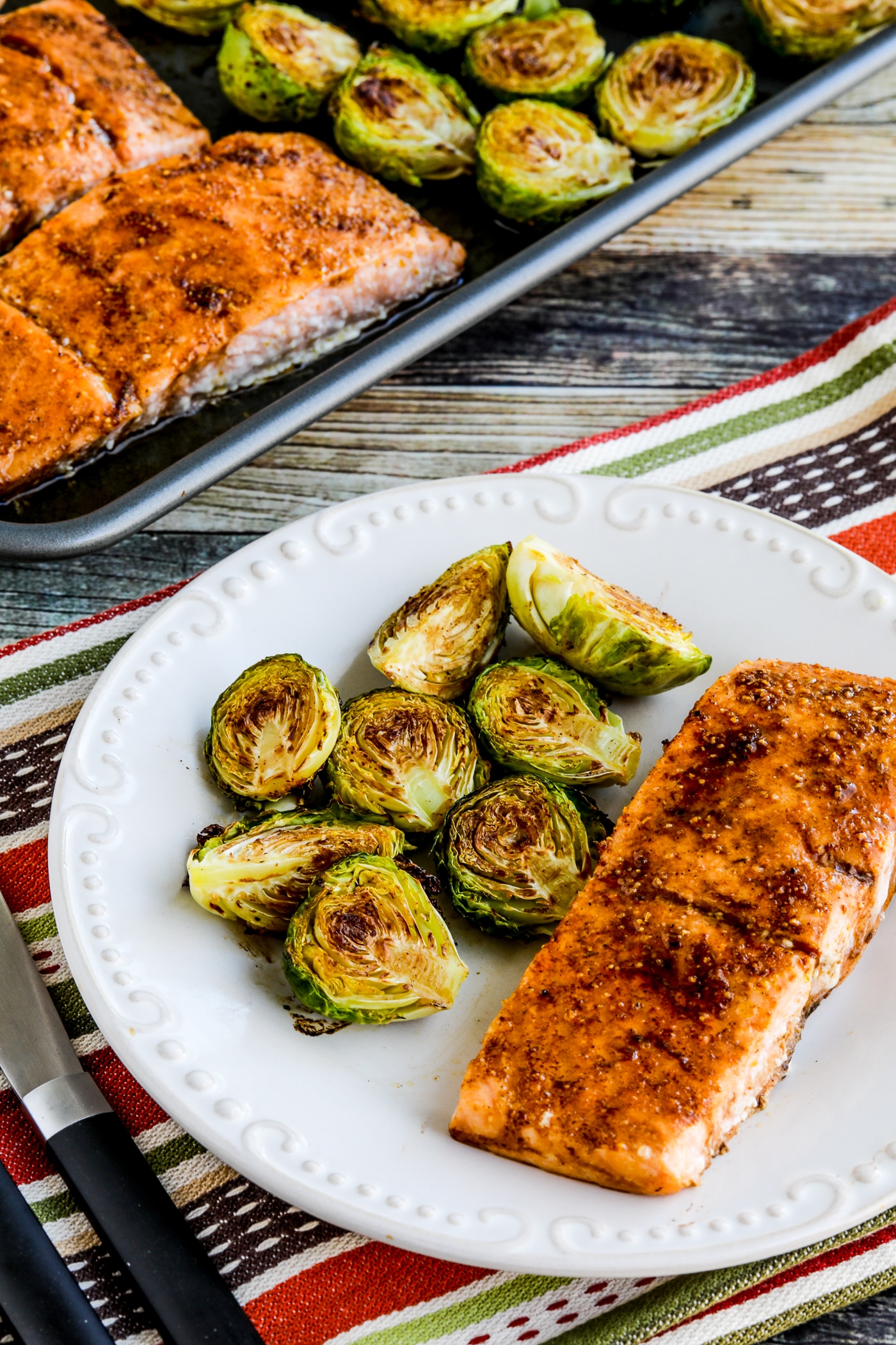 Roasted Brussels Sprouts and Salmon Sheet Pan Meal finished meal with one serving on plate