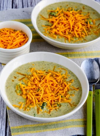 Cheesy Broccoli and Cauliflower Soup shown in two serving bowls