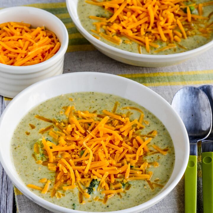 Cheesy Broccoli and Cauliflower Soup shown in two serving bowls