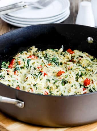 square image of Power Greens Egg Skillet shown in skillet on cutting board