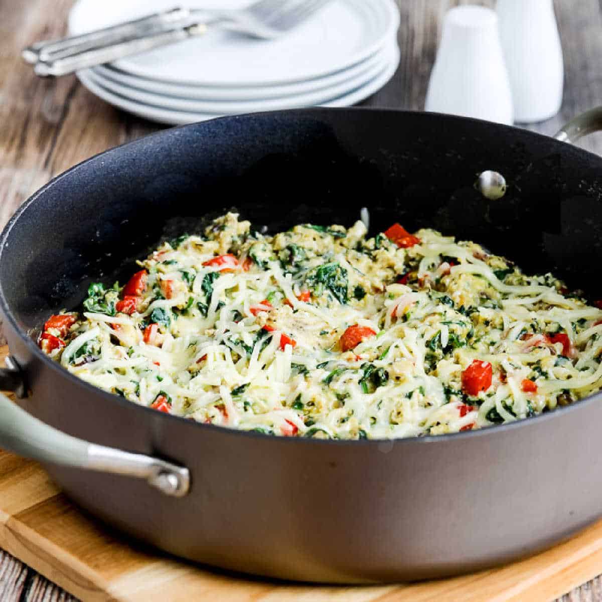 square image of Power Greens Egg Skillet shown in skillet on cutting board