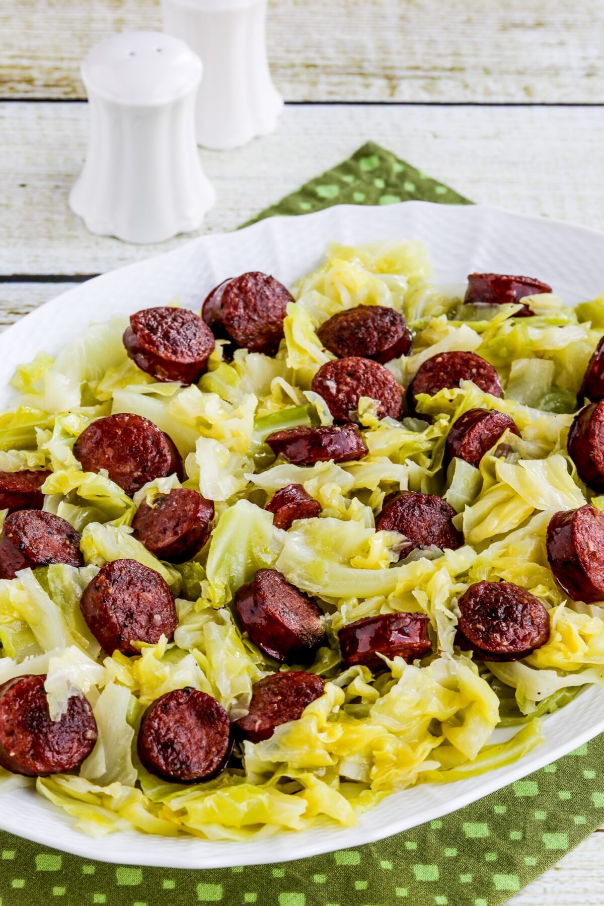 Instant Pot Cabbage and Sausage close-up photo on serving plate