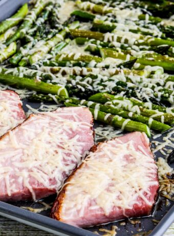 Easy Cheesy Baked Ham and Asparagus square thumbnail image of finished meal on sheet pan