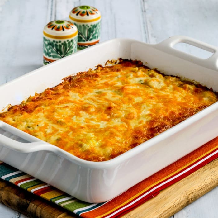 Layered Mexican Casserole with Chicken and Cauliflower Rice thumbnail square image of finished casserole in baking dish