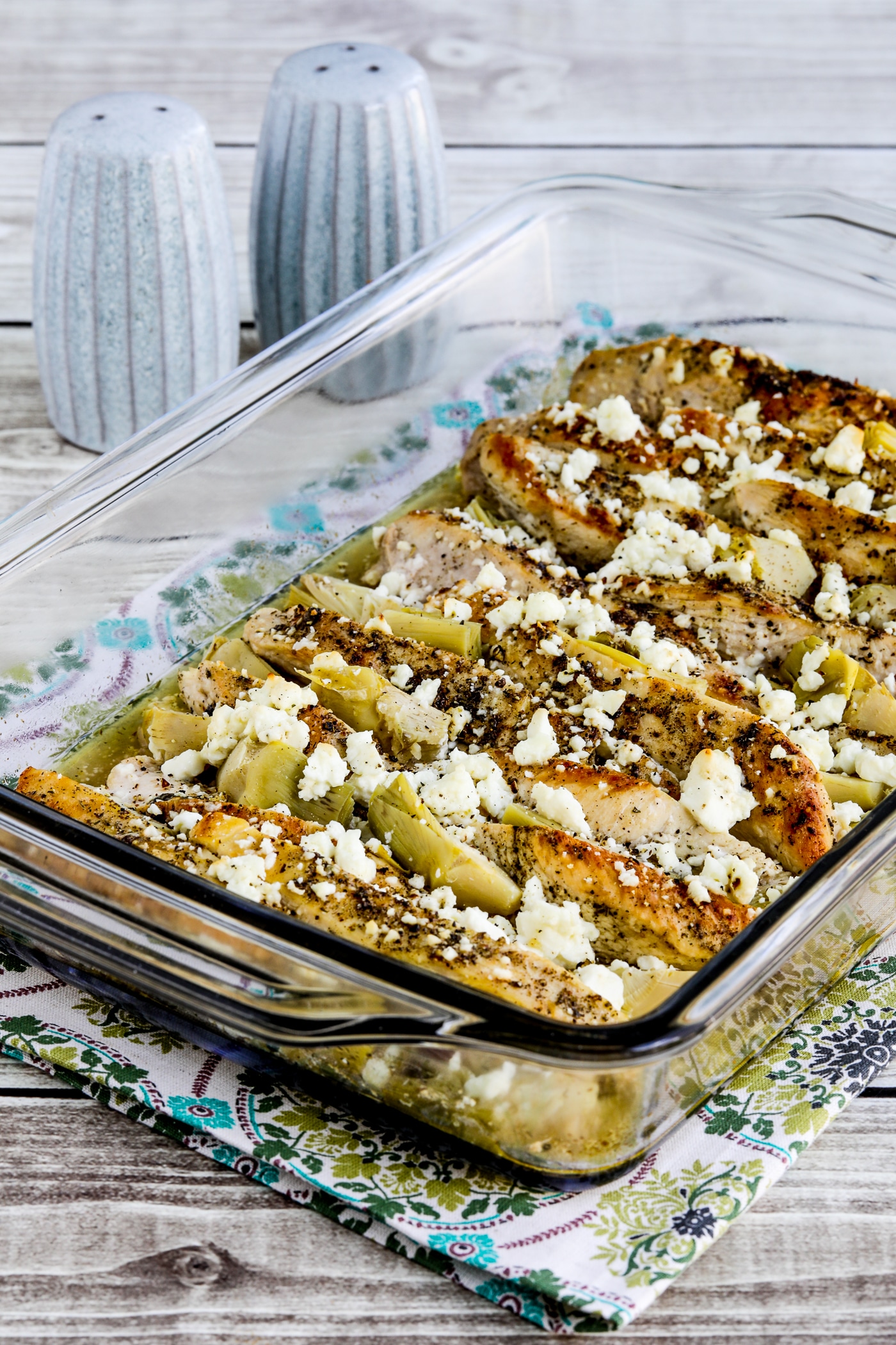 Artichoke Chicken Bake finished dish in baking pan