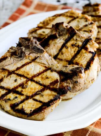 square image of Greek Pork Chops on serving plate