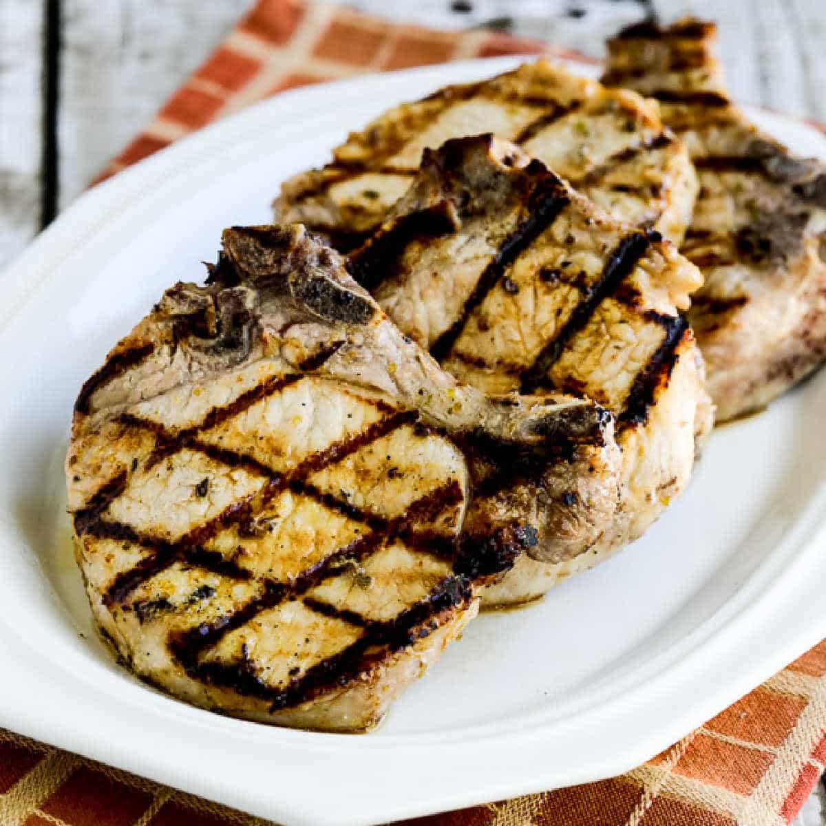 square image of Greek Pork Chops on serving plate
