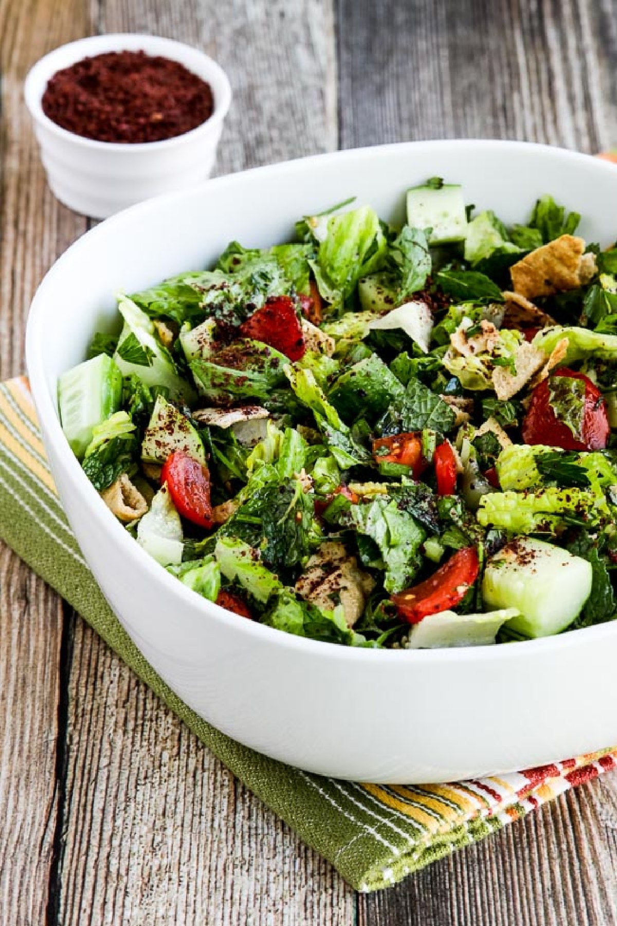 Fattoush Lebanese Salad on napkin with sumac in background