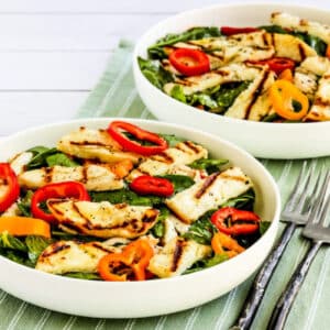 Grilled Halloumi Salad shown in two bowls on napkin.
