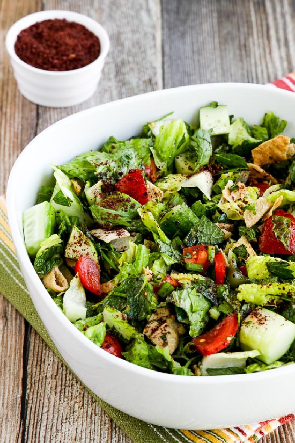 Fattoush Lebanese Salad in serving dish with Sumac in background