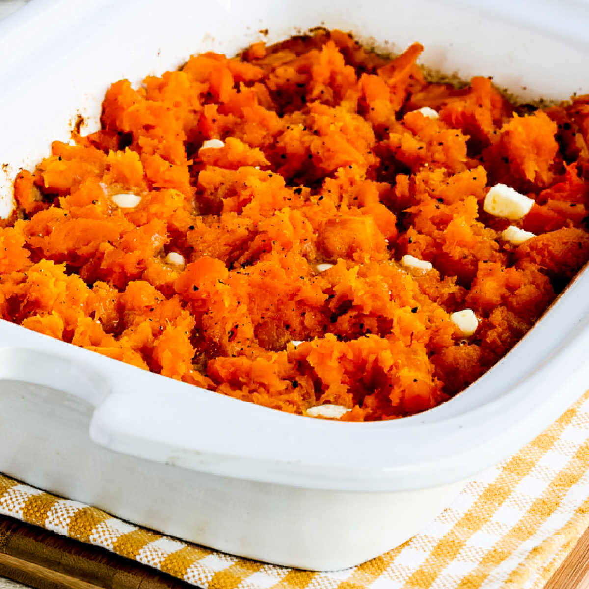 Square image for Slow Cooker Butternut Squash shown in Casserole CrockPot.