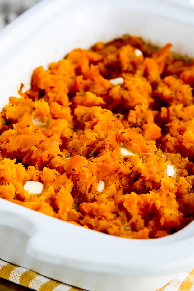 Close-up photo for slow cooker butternut squash shown in casserole crock-pot.