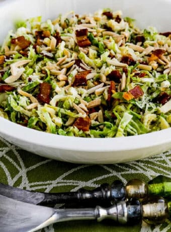 square image for Brussels Sprouts Salad with Bacon, Almonds, and Parmesan shown in serving dish