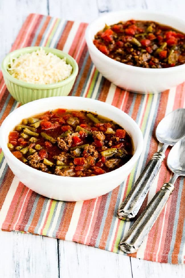 Instant Pot Soup with Ground Beef, Green Beans, and Tomatoes shown in two bowls on napkin