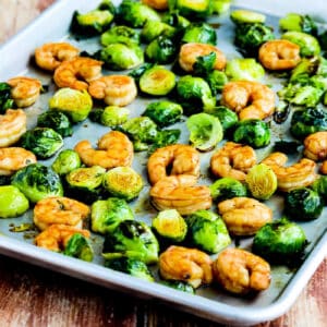 square image for Roasted Asian Shrimp and Brussels Sprouts Sheet Pan Meal shown on sheet pan.